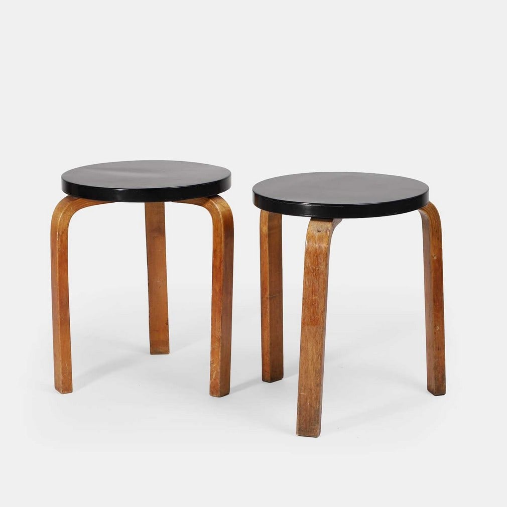 Alvar Aalto (Finnish, 1898-1976) for Finmar, a pair of 'model 60' stools, (1 of 3)