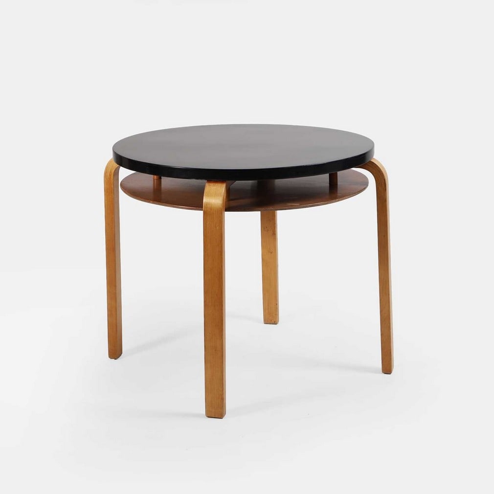 Alvar Aalto (Finnish, 1898-1976), a coffee table,: Alvar Aalto (Finnish, 1898-1976), a coffee table, designed 1933, circa 1930s, 'model 70', birch and ebonised wood (69cm diameter, 55.5cm high) Provenance: A private collection, London. Condition Repor