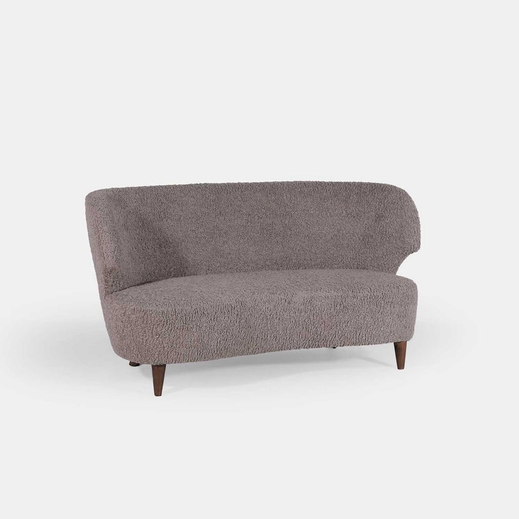 Carl-Johan Boman (Finnish, 1883-1969) for Oy Boman Ab, a curved three-seater sofa,: Carl-Johan Boman (Finnish, 1883-1969) for Oy Boman Ab, a curved three-seater sofa, circa 1940s, later upholstered in grey bouclé fabric, with buttoned backrest, and raised on four tapered beech f