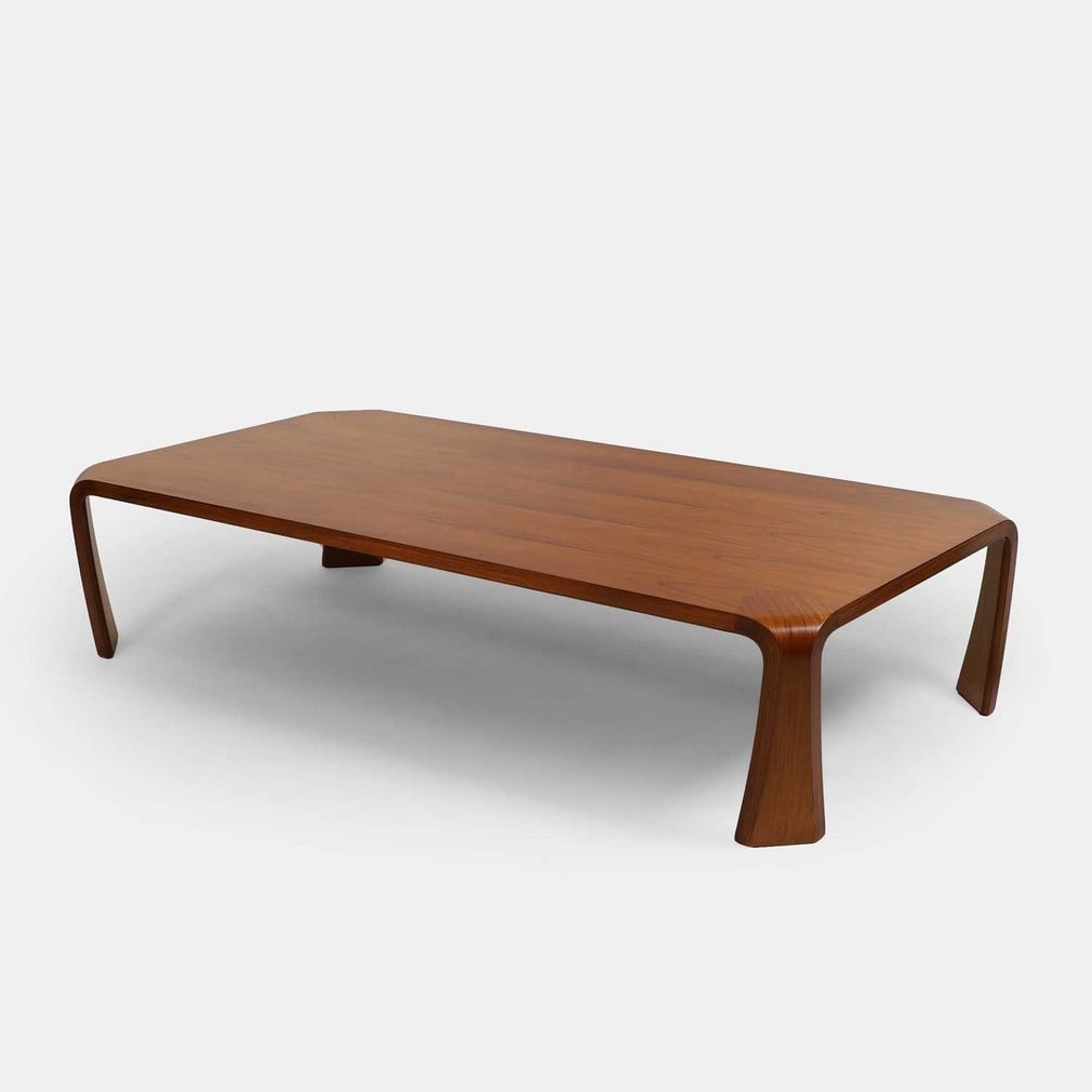 Saburo Inui (Japanese, 1911-1991), a 'Zataku' table,: Saburo Inui (Japanese, 1911-1991), a 'Zataku' table, 1959, Indian rosewood, manufactured by Tendo Mokko, with applied manufacturer's label (150cm wide, 75.5cm deep, 34cm high) Condition Report: Overal