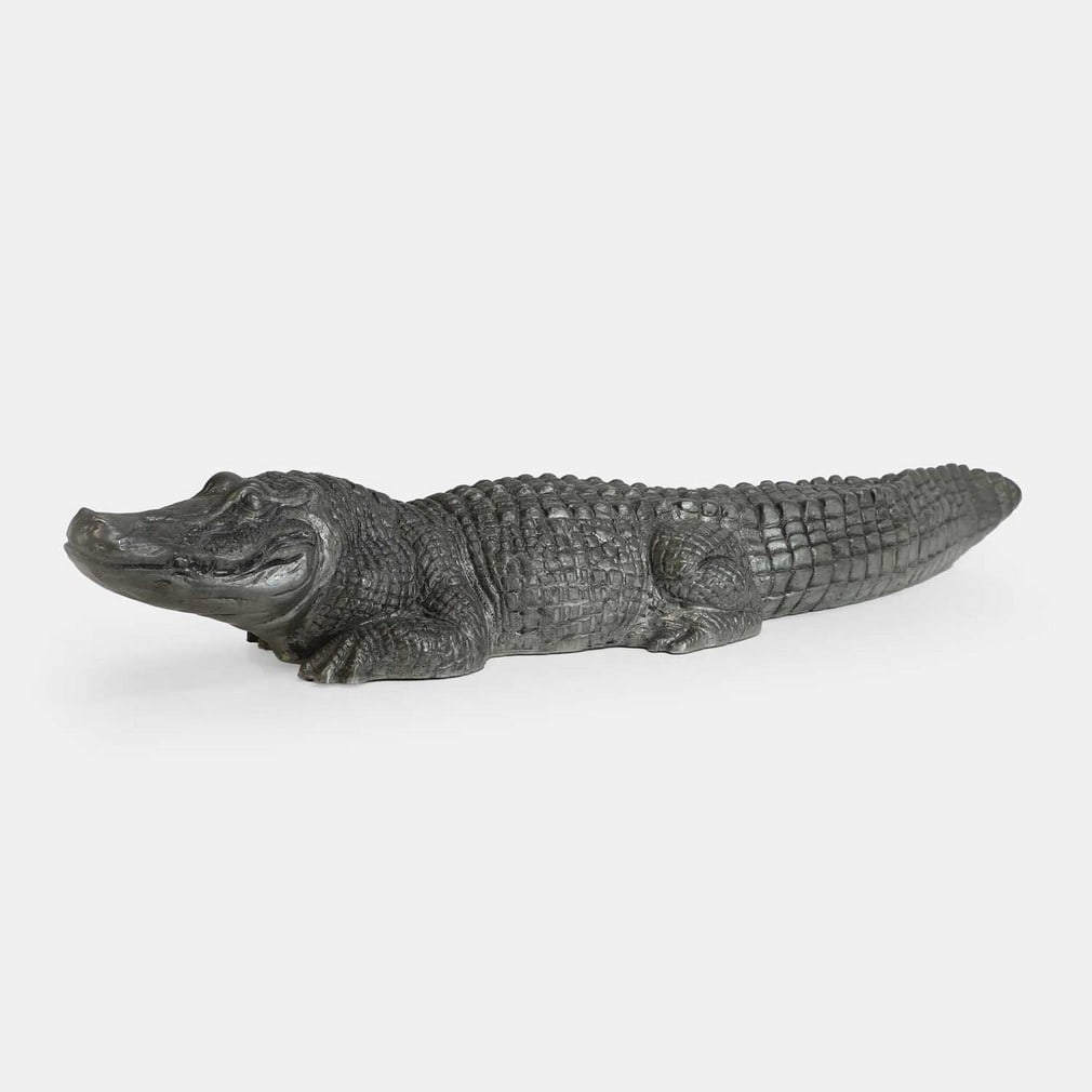 Piero Figura (Italian, b.1956) for Atena, a large pewter alligator,: Piero Figura (Italian, b.1956) for Atena, a large pewter alligator, late 20th century, modelled in repose, stamped 'Figura Piero per Atena Etain 95%' (13cm wide, 65cm deep, 9.5cm high) Condition
