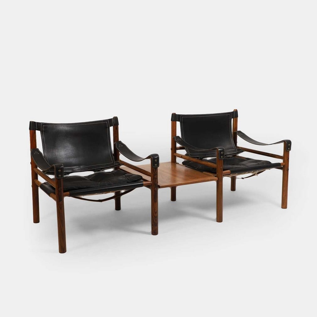 § Arne Norell (Swedish, 1917-1971), a pair of rosewood 'Sirocco' armchairs, (1 of 2)