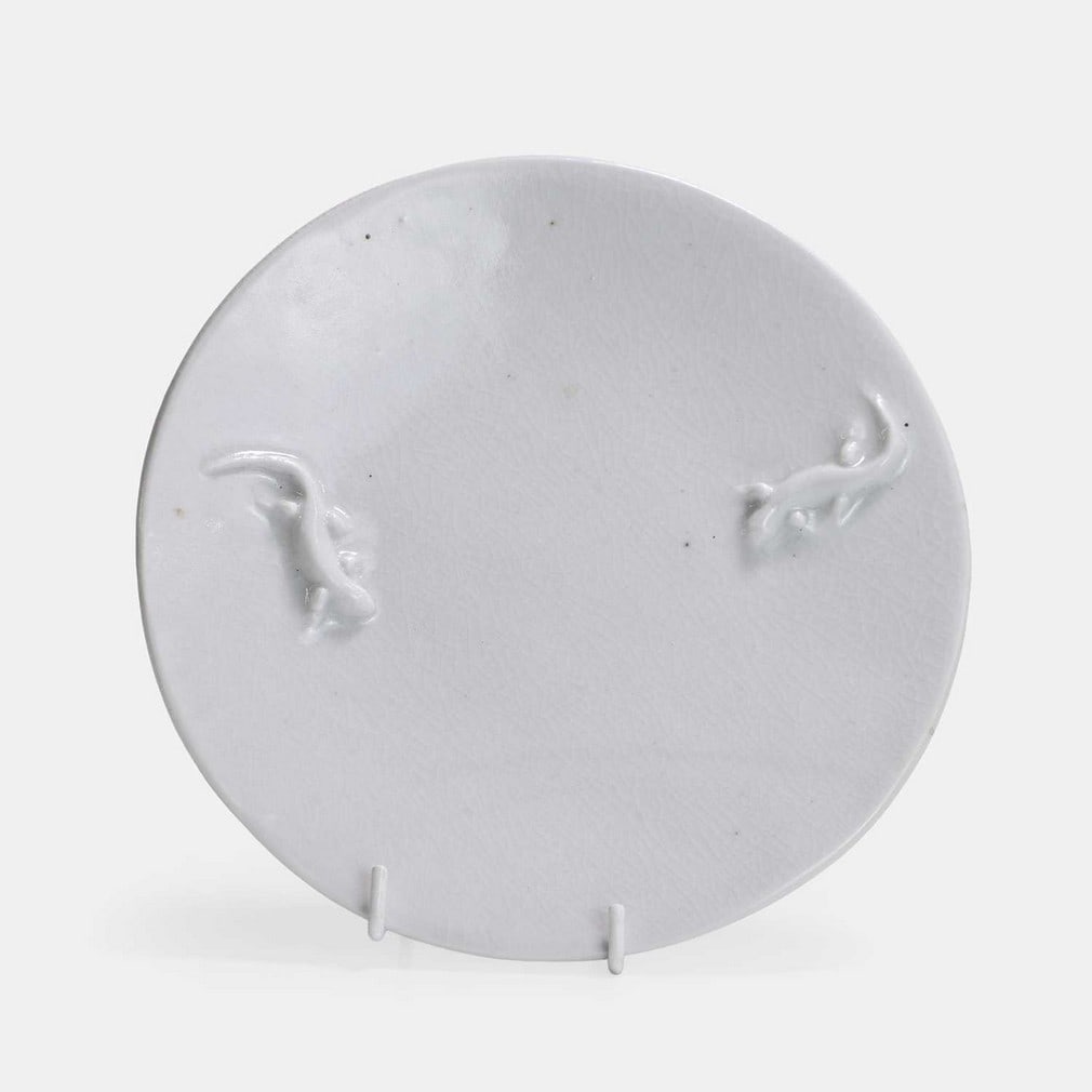 Akiko Hirai (Japanese, b.1970), a plate,: Akiko Hirai (Japanese, b.1970), a plate, porcelain, with lizard detail, impressed maker's signature (18cm diameter, 2cm high) Provenance: A private collection, London.