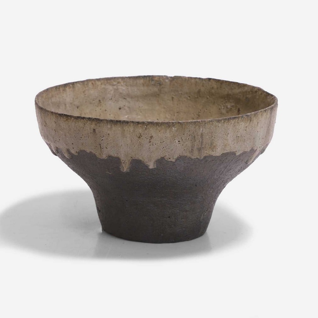 ▲ Paul Philp (British, b.1941), a stoneware flared vessel,: ▲ Paul Philp (British, b.1941), a stoneware flared vessel, the brown textured surface with a grey drip glaze, impressed maker's mark (21cm diameter, 12cm high) Condition Report: Good overall con