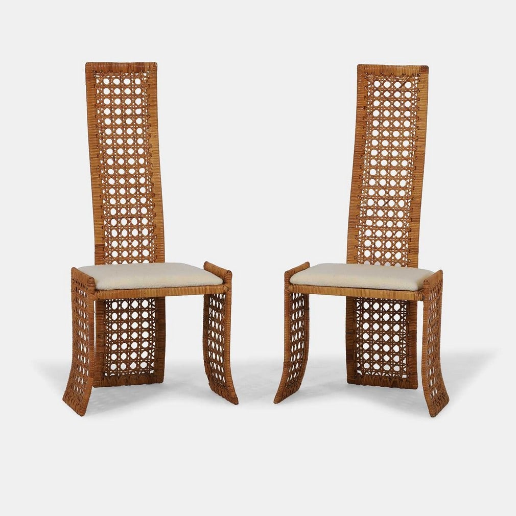 Manner of Danny Ho Fong, a pair of high-back chairs,: Manner of Danny Ho Fong, a pair of high-back chairs, of recent manufacture, each woven cane frame with a cream pile seat pad (48.5cm wide, 46cm deep, 112cm high, 44cm to seat) (2) Condition Report: