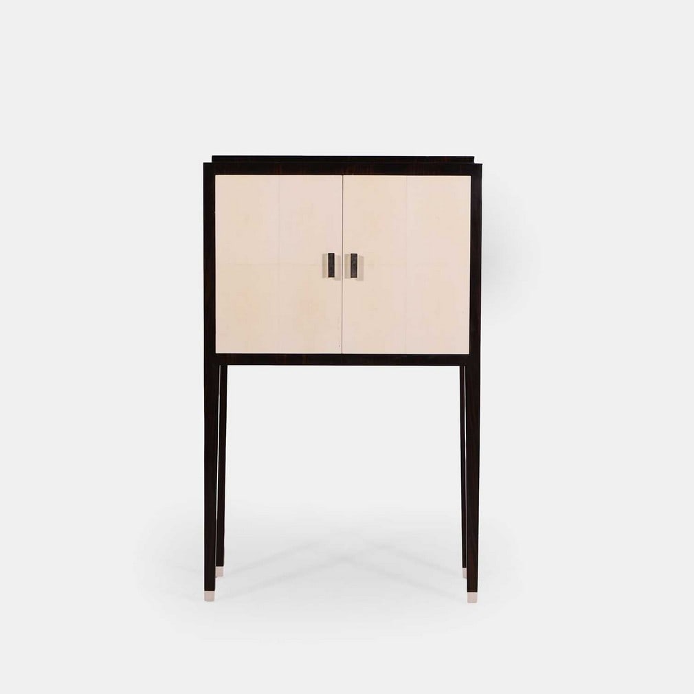 Contemporary, a faux shagreen and Macassar cabinet,: Contemporary, a faux shagreen and Macassar cabinet, of recent manufacture, of rectangular form with a stepped top, over cream faux shagreen double doors with metal trapezoid handles, opening to reveal