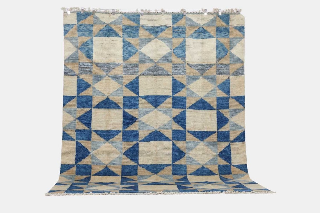 Mid-century Scandinavian-inspired, a flat-weave wool kilim,: Mid-century Scandinavian-inspired, a flat-weave wool kilim, woven with chevrons in tones of blue and white (329 x 254cm)