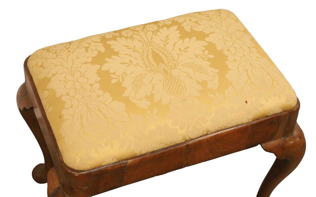 A George I walnut stool, 18th century and later, - 2
