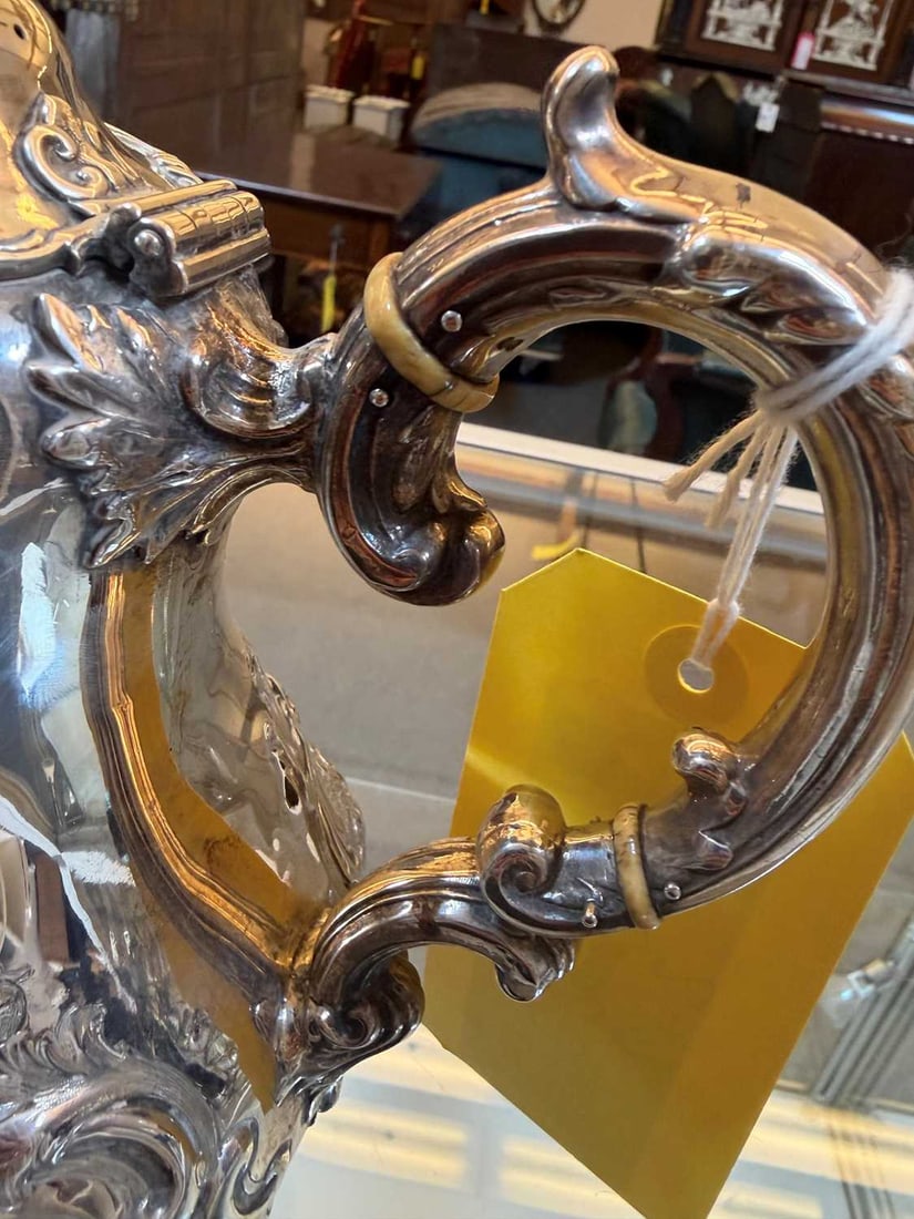 A silver coffee pot, - 5