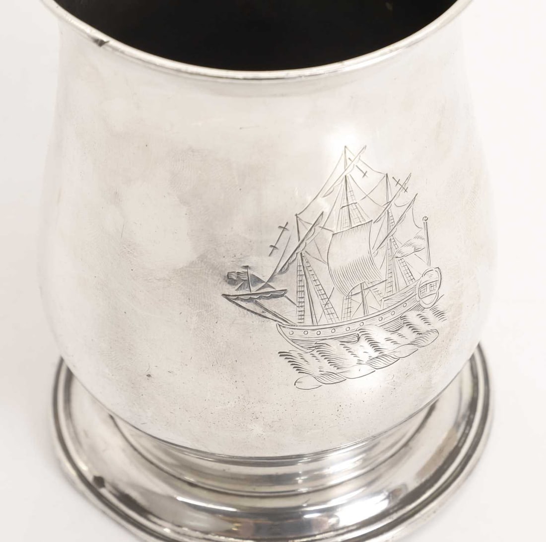 A silver tankard, - 2