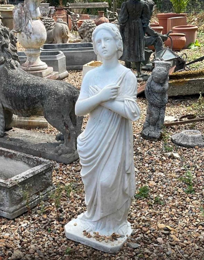 A neoclassical carved marble figure, 20th century,: A neoclassical carved marble figure, 20th century, modelled as a female in a draped robe 38cm wide, 115cm high