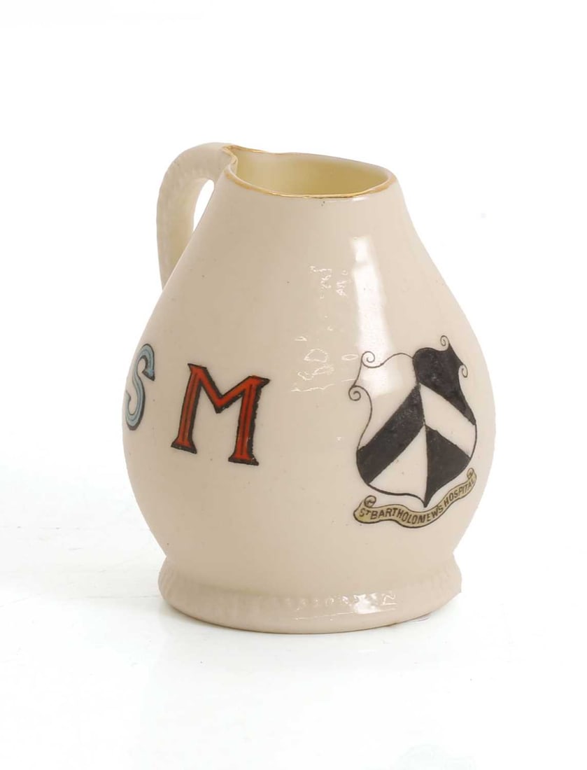 A W.H. Goss jug,: A W.H. Goss jug, initialled and dated 'R S M 1658', with Bartholomew's Hospital coat of arms to the center, the base with stamped marks 7.5cm wide, 8cm high Condition Report: Some fading to the
