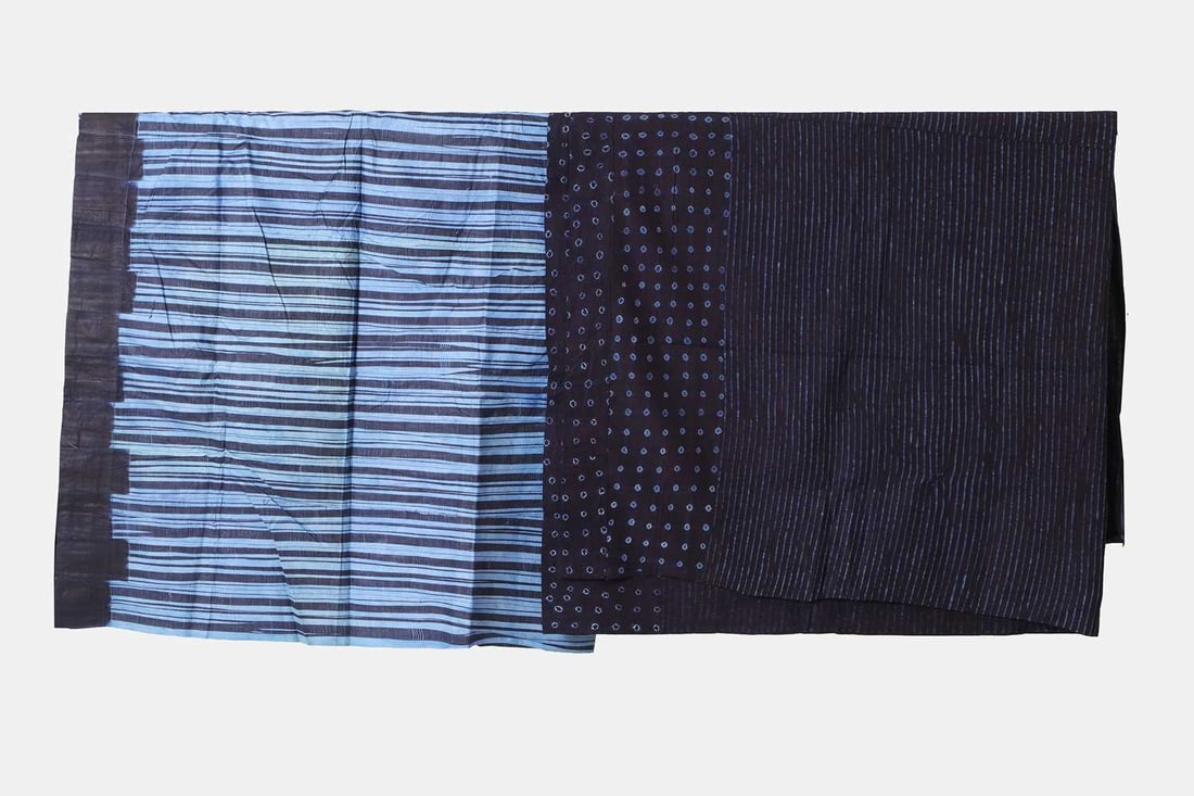 Two Yoruba adire alabere cloths, third quarter of the 20th century, Nigerian,: Two Yoruba adire alabere cloths, third quarter of the 20th century, Nigerian, each resist-dyed with various patterns 196 x 138cm and 198 x 165cm 2 Provenance: The Judith Appio Textiles Collection.