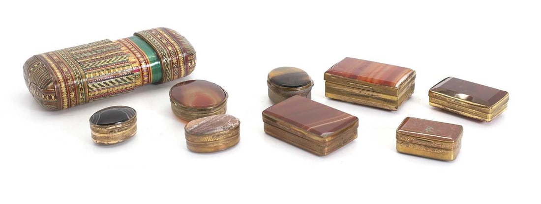 A collection of agate boxes,: A collection of agate boxes, to include square and oval examples, and an oval tiger's eye example, and a straw work box The largest, 6cm wide, 4cm deep 9 Condition Report: The largest example with