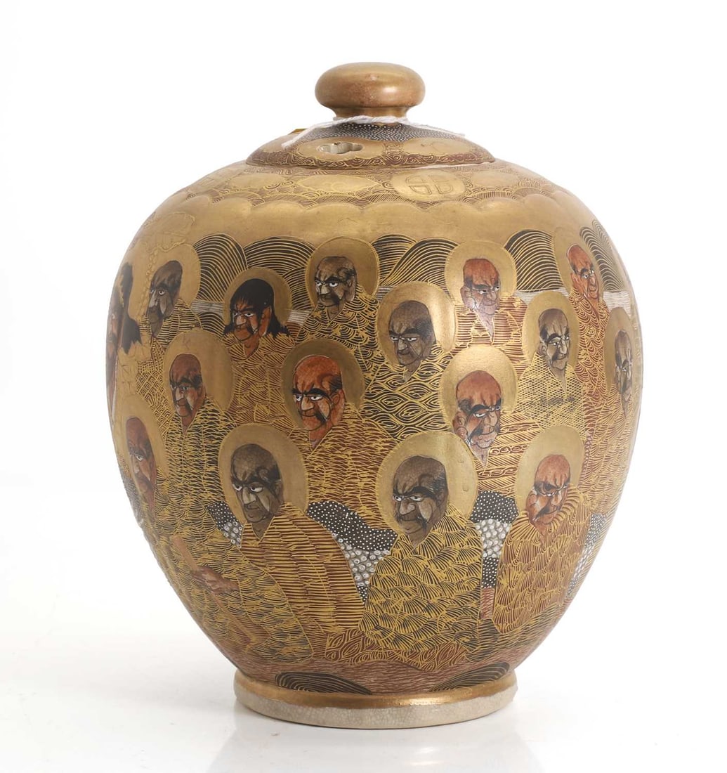 A Japanese Satsuma vase and cover,: A Japanese Satsuma vase and cover, the oviod body is decorated with 1000 faces, and the lid with a pierced cloud motif, and painted character mark to the base 21cm wide, 22.5cm high 2 Condition