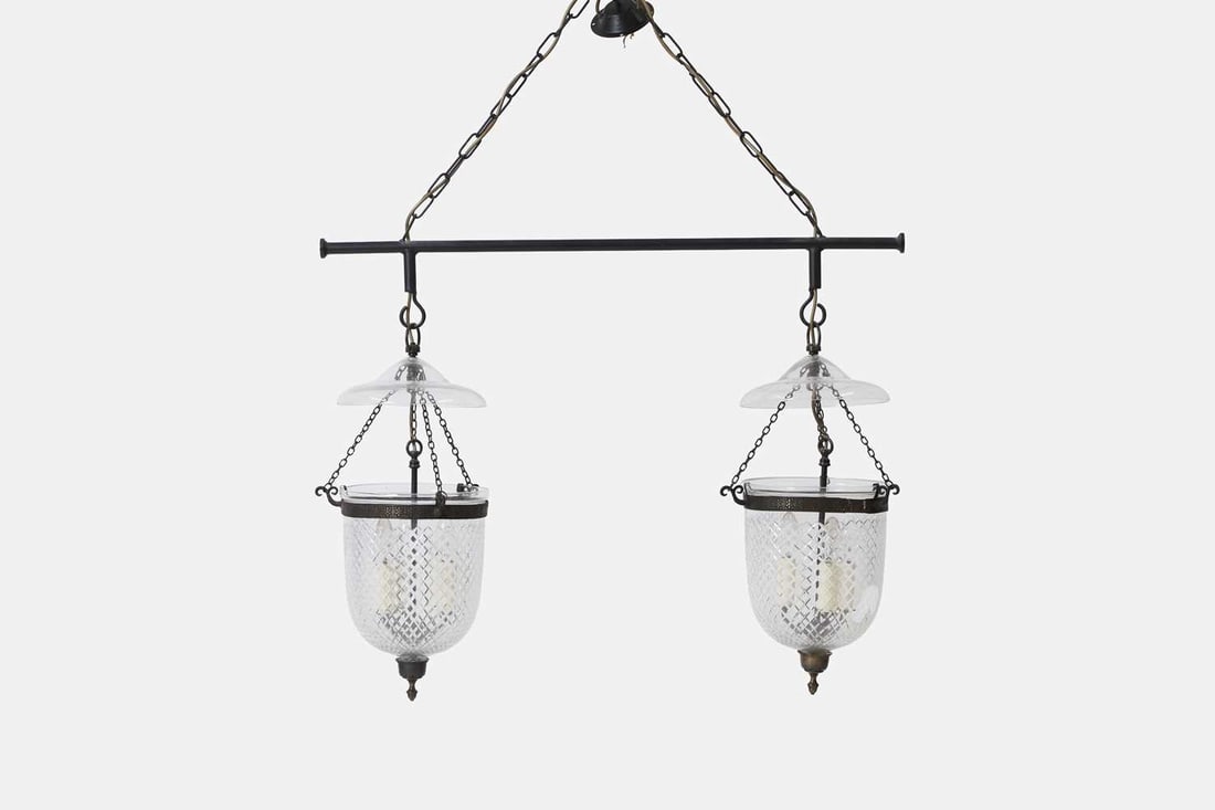 A George III-style ceiling light, of recent manufacture,: A George III-style ceiling light, of recent manufacture, the two suspended glass dome shades each with three sconces issuing light bulbs, fitted for electricity 91cm wide, 119cm high overall; shade