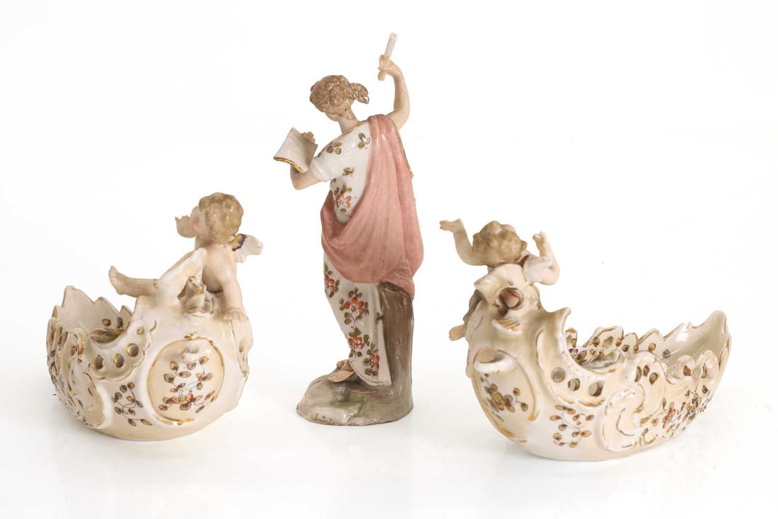 A pair of Continental porcelain salts, - 2