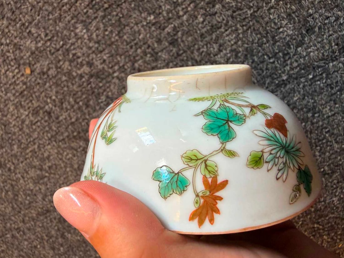 A pair of Chinese enamelled teabowls, - 10