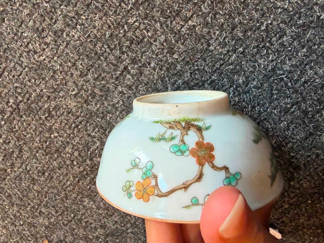 A pair of Chinese enamelled teabowls, - 11
