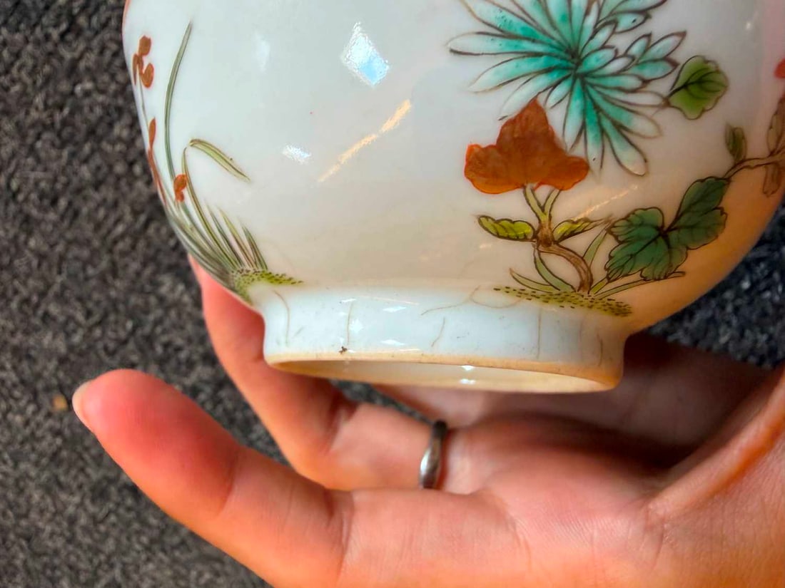 A pair of Chinese enamelled teabowls, - 12