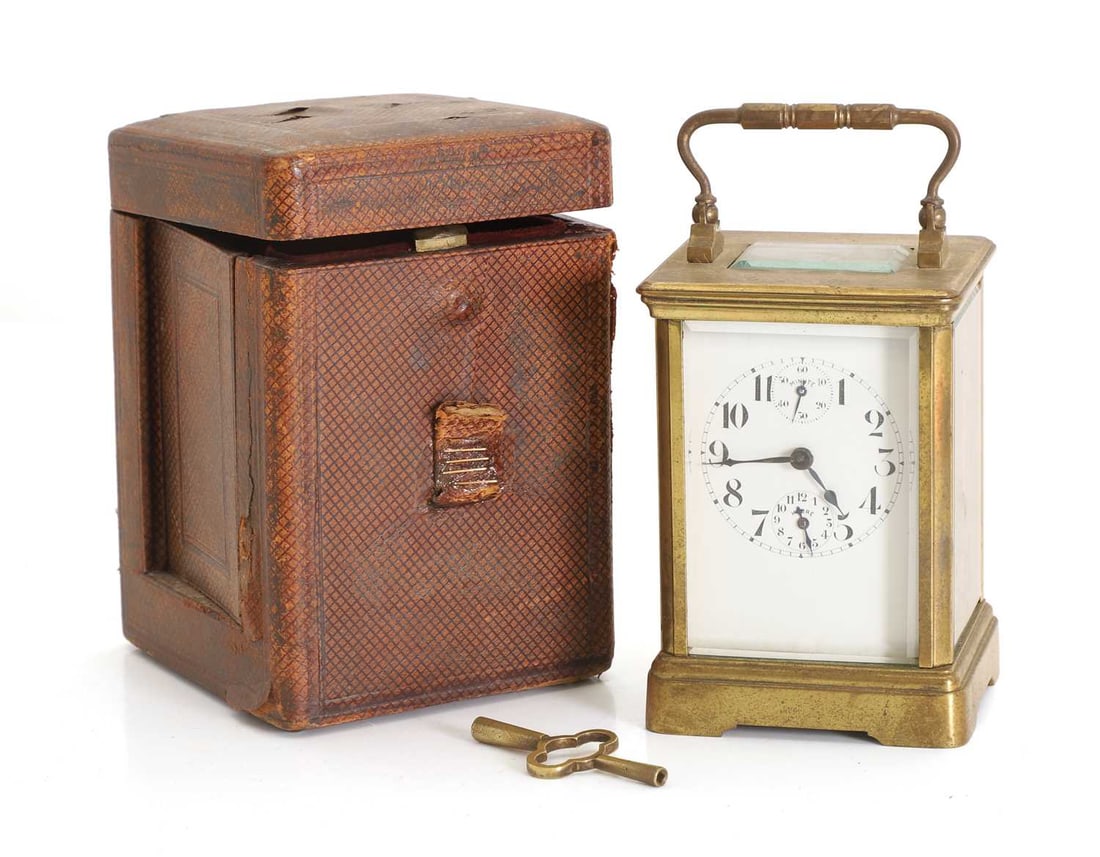 A small brass carriage clock, early 20th century, French, (1 of 2)