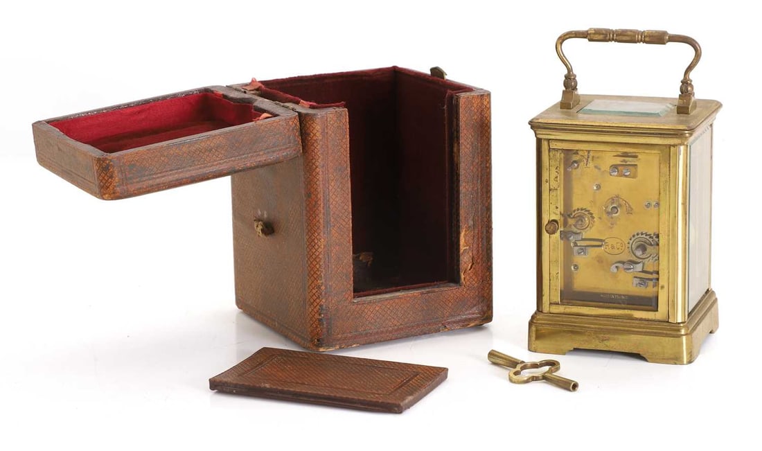 A small brass carriage clock, early 20th century, French, - 2