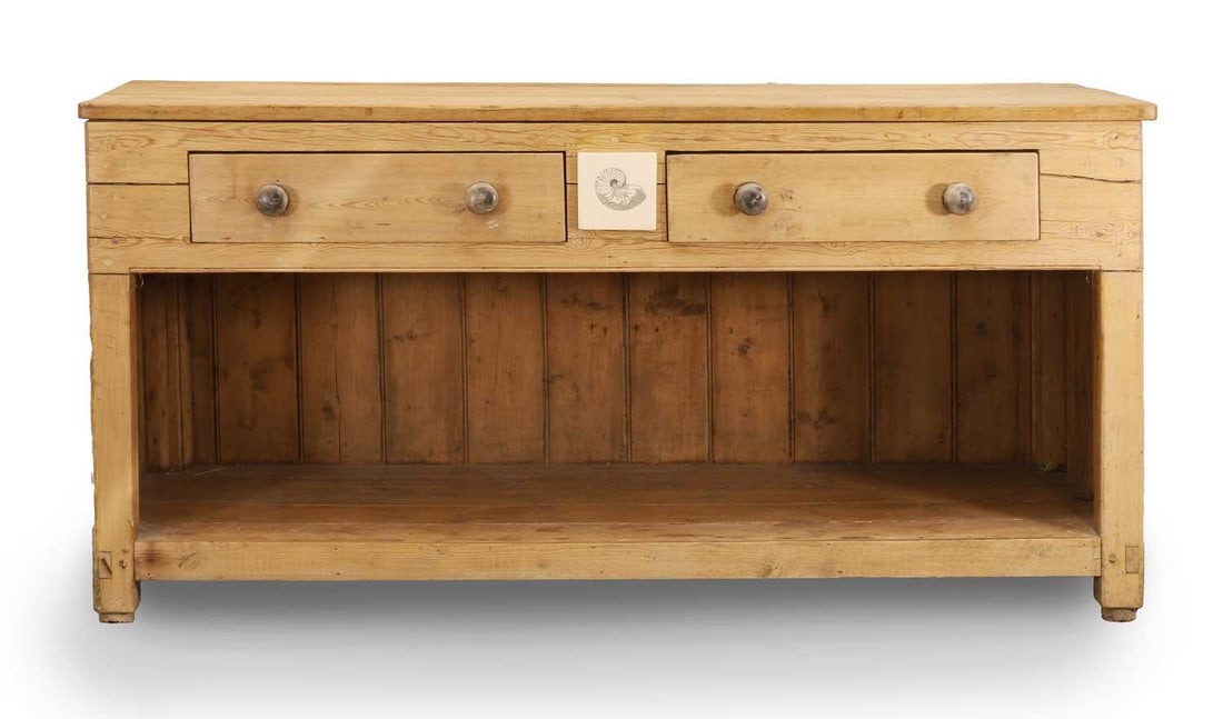 A pine baker's table, 20th century,: A pine baker's table, 20th century, the front with two drawers with shell motif tiles to the centre, with a plank top 185cm wide, 72cm deep, 92cm high Condition Report: The tile is a later addition