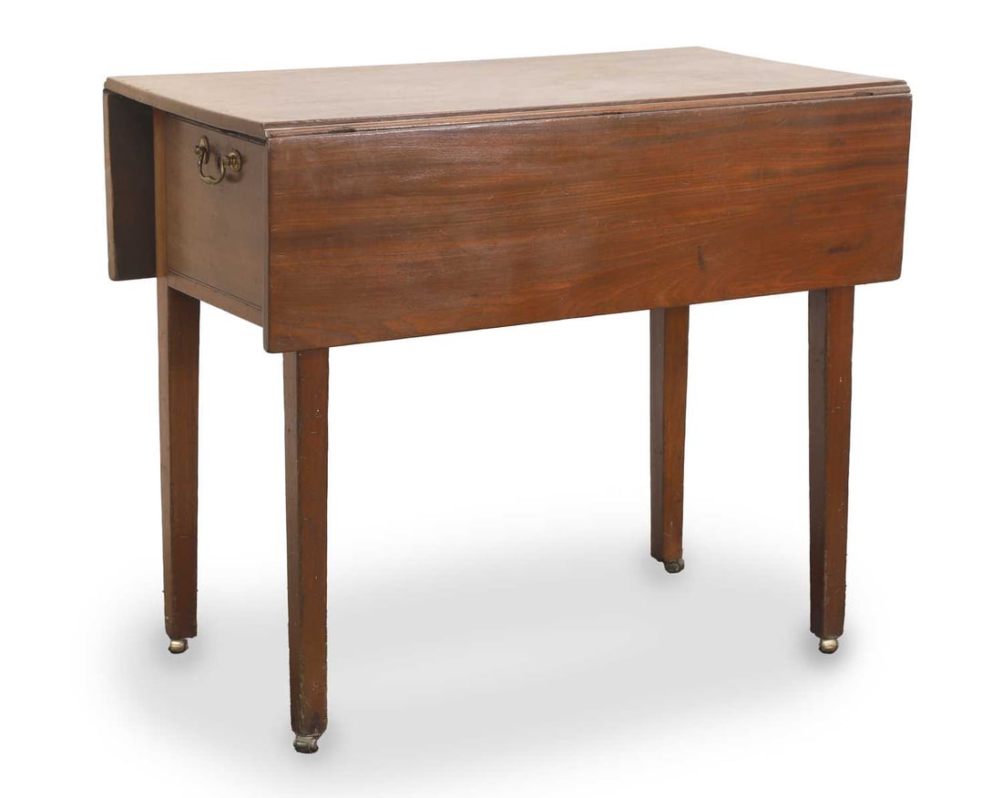 A George III mahogany supper table, c.1770,: A George III mahogany supper table, c.1770, with fitted deep drawer, with brass pull handle, on square chamfered legs and brass barrel casters 94cm open, 87cm wide, 73cm high
