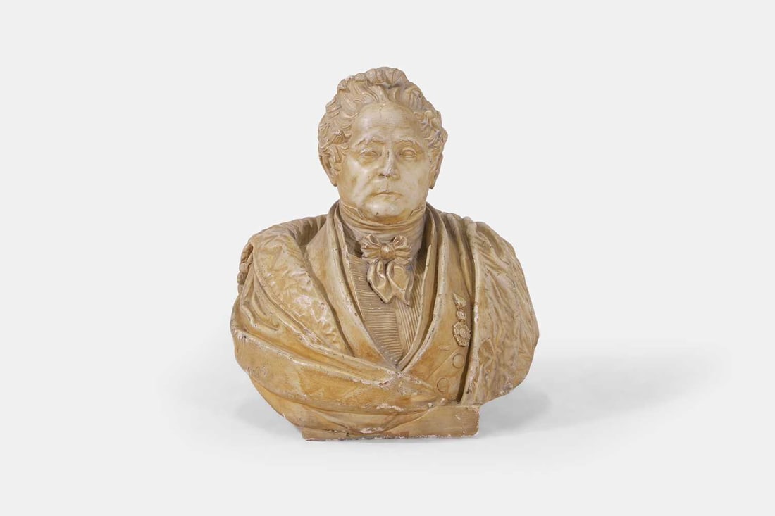 A large plaster portrait bust, late 19th century, possibly of King Louis Philippe I of France,: A large plaster portrait bust, late 19th century, possibly of King Louis Philippe I of France, mounted on an integral plinth base 56cm wide, 50cm deep, 62cm high