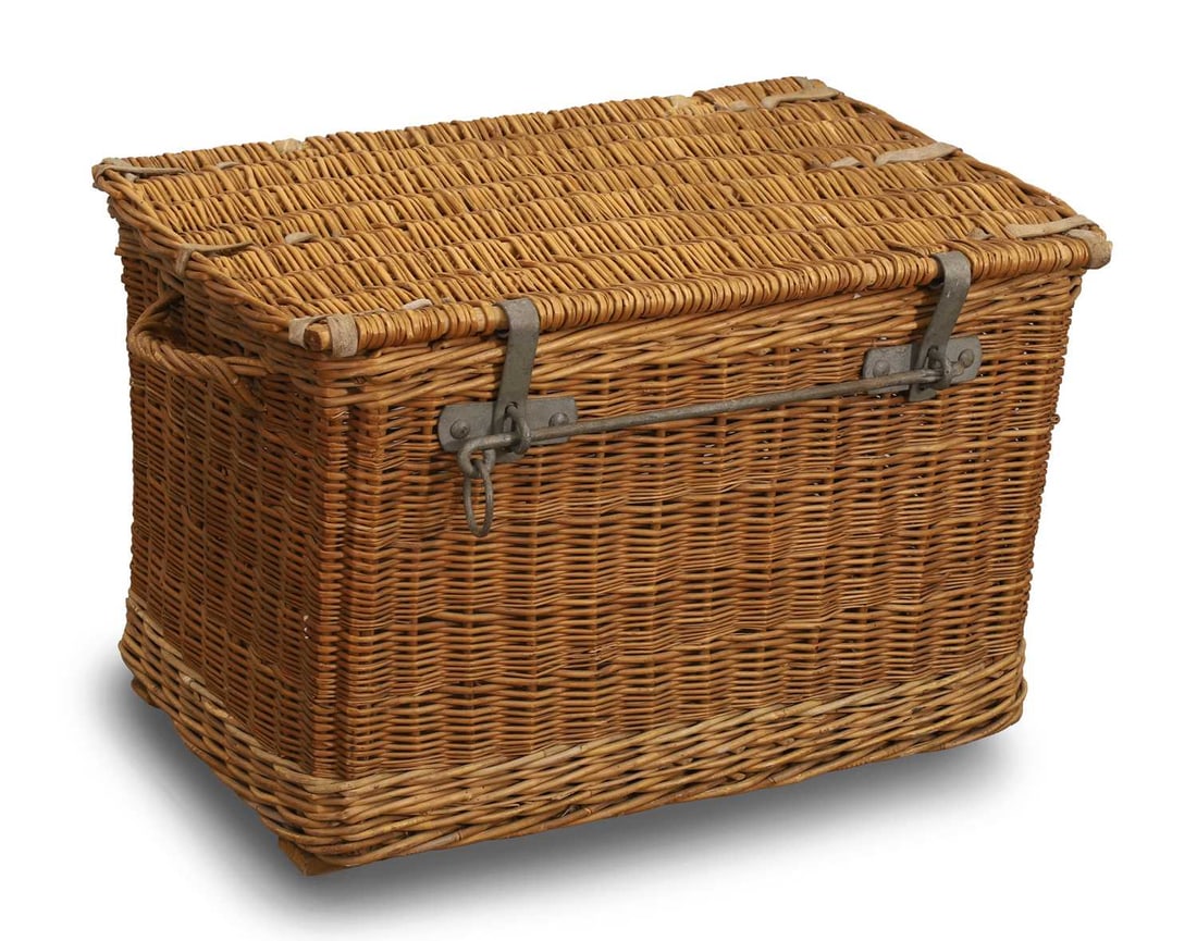 A wicker basket, 20th century,: A wicker basket, 20th century, with metal clasp and locking bar and side wicker carrying handles 81cm wide, 50cm deep, 48cm high