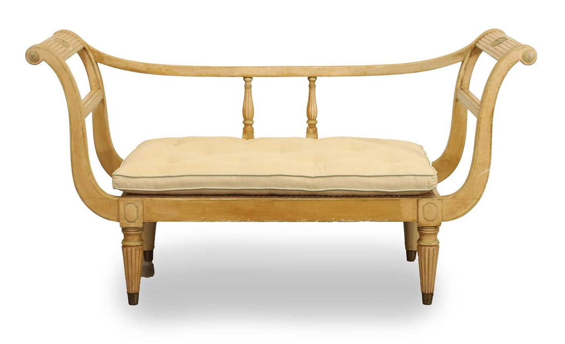 A Louis XVI-style painted wooden window seat or canape, early 20th century,: A Louis XVI-style painted wooden window seat or canape, early 20th century, with a cane seat and upholstered squab cushion all on the white and green painted frame 143cm wide, 56cm deep, 76cm high