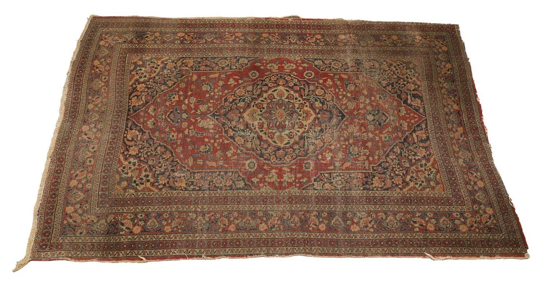 Persian floral rug, c.1880,: Persian floral rug, c.1880, with central red ground field, 183cm wide 131cm deep 3 Condition Report: stains, wear and fading throughout, tattered edges,