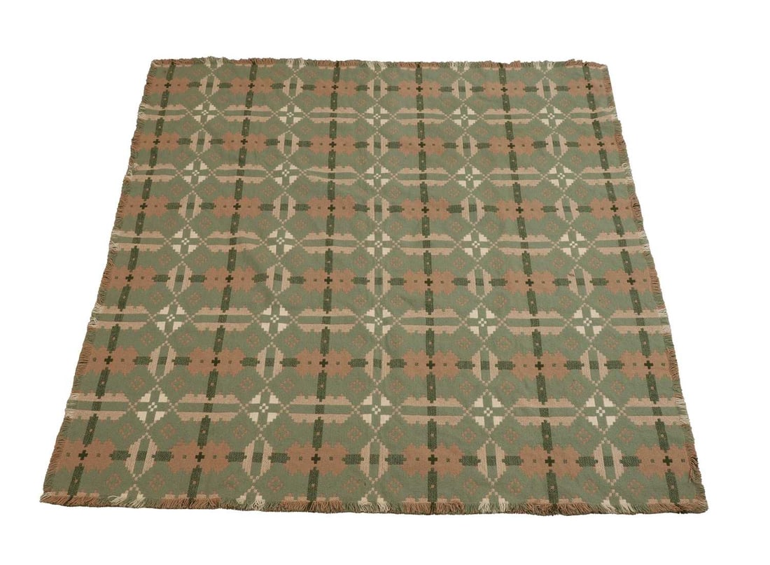 A Brynkir Welsh blanket,: A Brynkir Welsh blanket, with green ground with a geometric pattern, sewn label to one corner 153cm wide, 153cm high Condition Report: machine woven