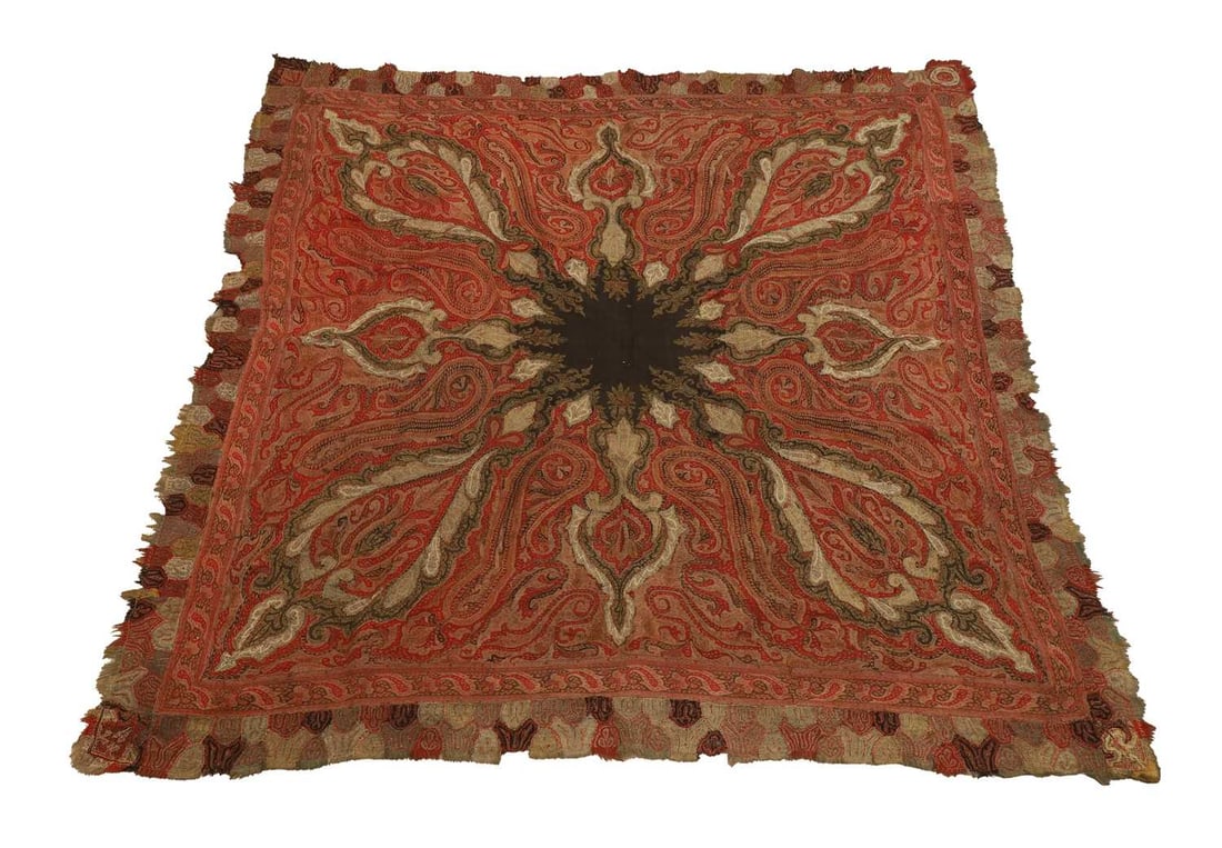 Kashmiri wool shawl, 19th century,: Kashmiri wool shawl, 19th century, with deep red patterned ground and large black medallion to the centre 168cm wide, 170cm deep Condition Report: Some holes and tears near the edges and some smaller
