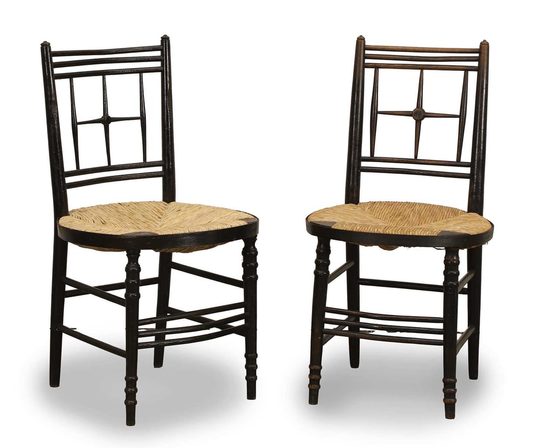 A pair of Arts & Crafts painted 'Sussex' side chairs, late 19th century,: A pair of Arts & Crafts painted 'Sussex' side chairs, late 19th century, after the design by Ford Madox-Brown, with reeded seats and bobbin turned legs 46cm wide, 43cm deep, 85cm high 2