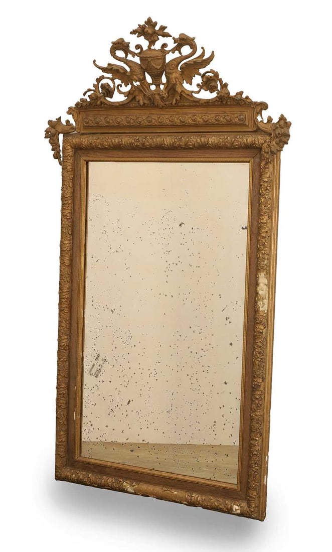 A French gilt gesso framed pier mirror, 19th century,: A French gilt gesso framed pier mirror, 19th century, the crest centred by a jardinier flanked by two dragons, the frame profusely carved with acanthus and floral motifs over a textured ground,
