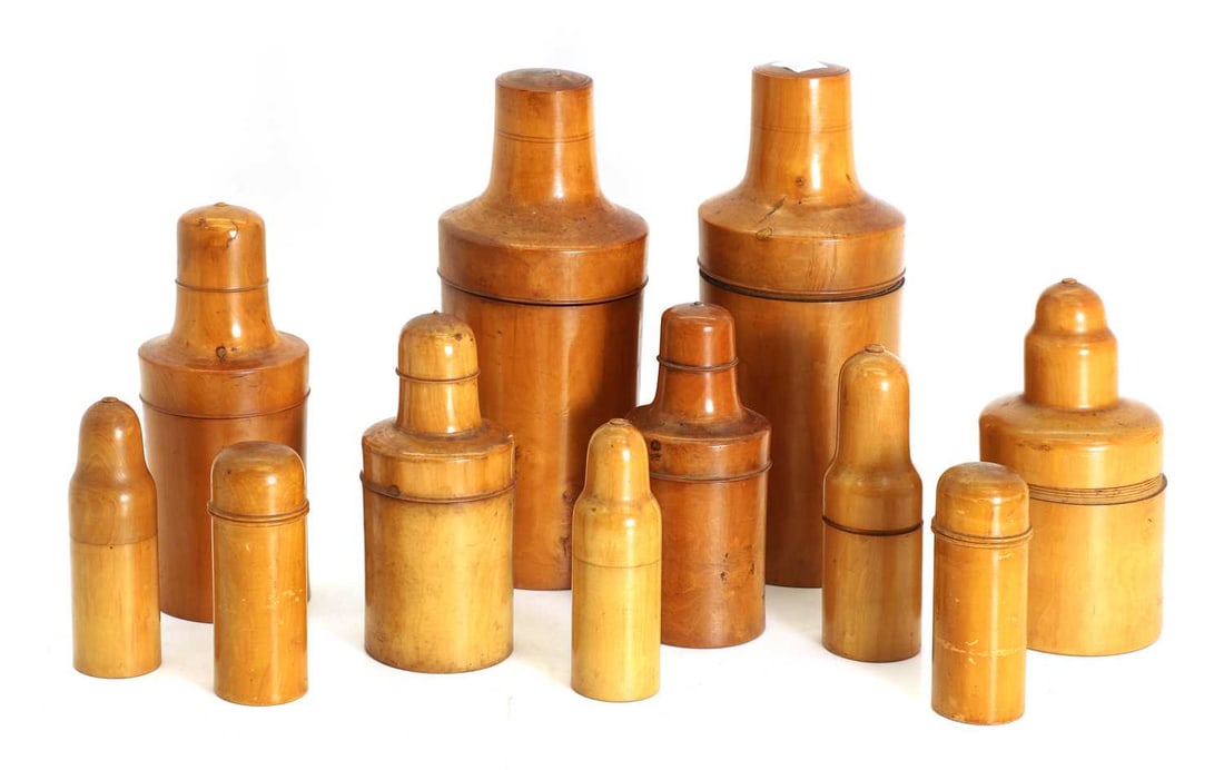 A set of Treenware bottle holders, 19th century, (1 of 2)