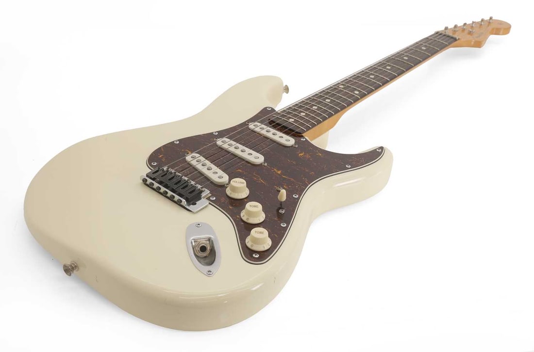 A 1999 Fender Stratocaster, - 2