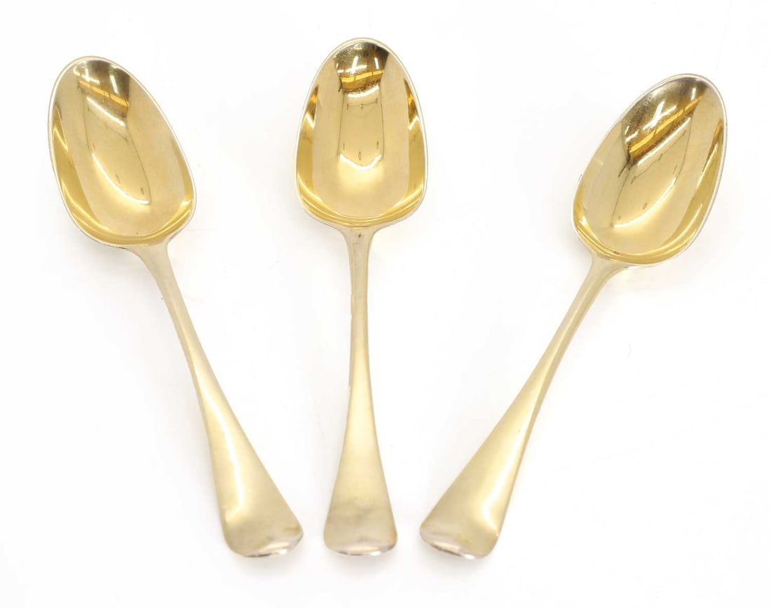 A group of three silver gilt spoons,: A group of three silver gilt spoons, possibly by Ebenezer coker, 1767, with Prince of Wales feather Crest, all later gilded15.6cm long 15.6cm long, 3.6ozt 3