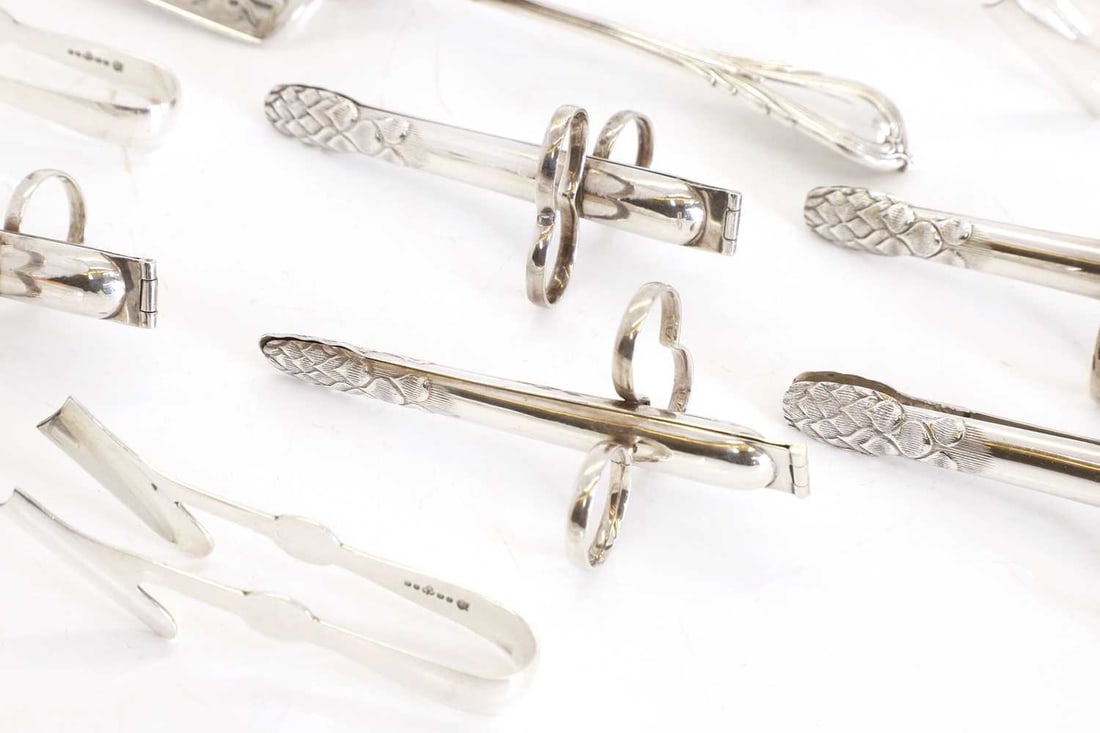 A collection of silver plated flatware, - 2