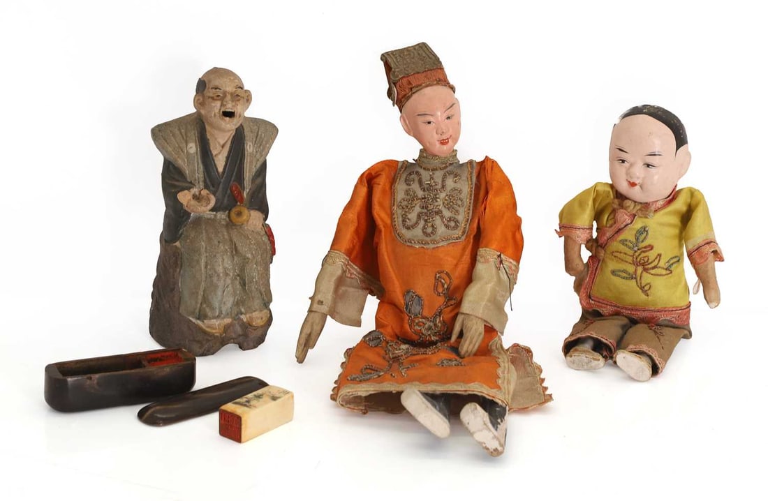 A Yixing Zisha clay scholar figure,: A Yixing Zisha clay scholar figure, cold painted together with a Chinese opera doll with clay head and wooden feet in silk robe, and a Chinese boy doll in silk vintage dress papier-mache and a Chinese