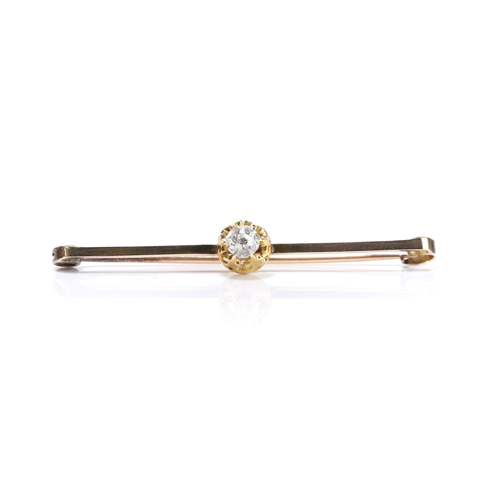 A diamond set bar brooch, (1 of 2)
