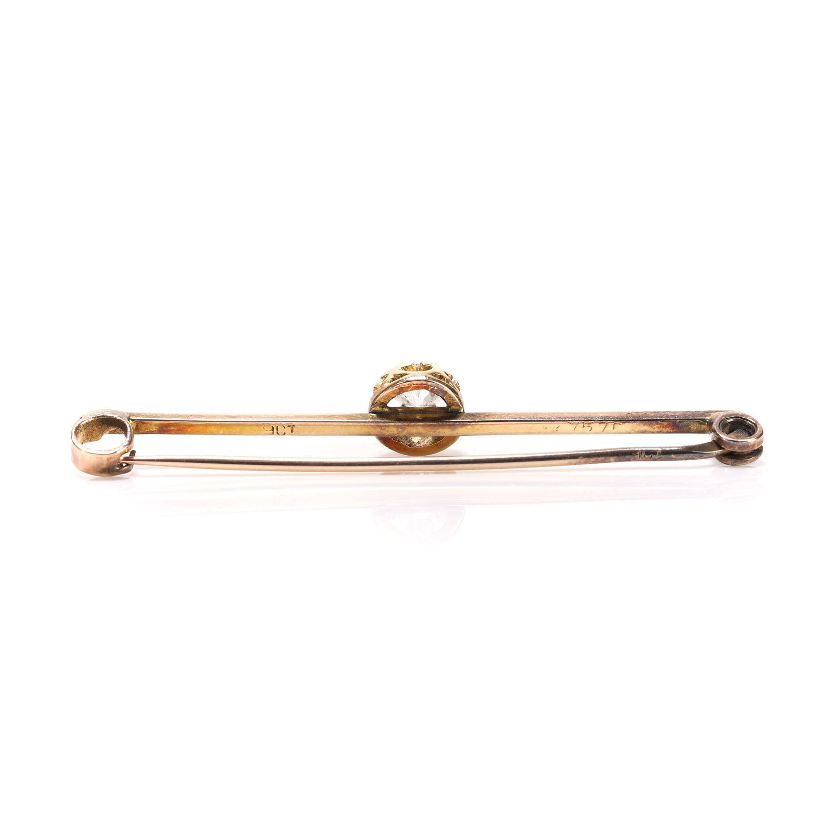A diamond set bar brooch, - 2