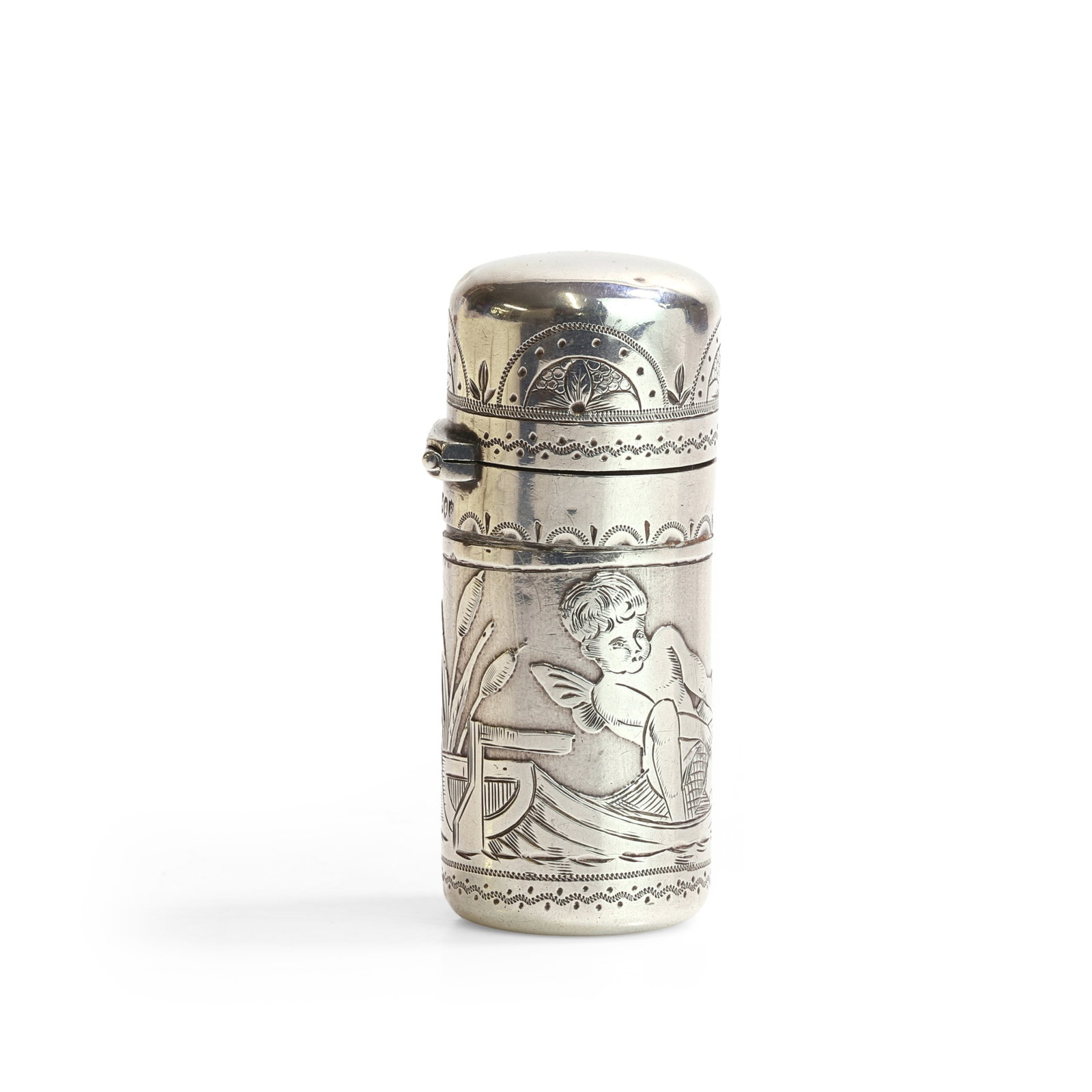 Sampson Mordan, a late Victorian silver perfume bottle,: Sampson Mordan, a late Victorian silver perfume bottle, etched and engraved with a cherub fishing, with a hinged lid, gilt internally and enclosing a glass bottle with stopper, London 1880 (Length 5.5
