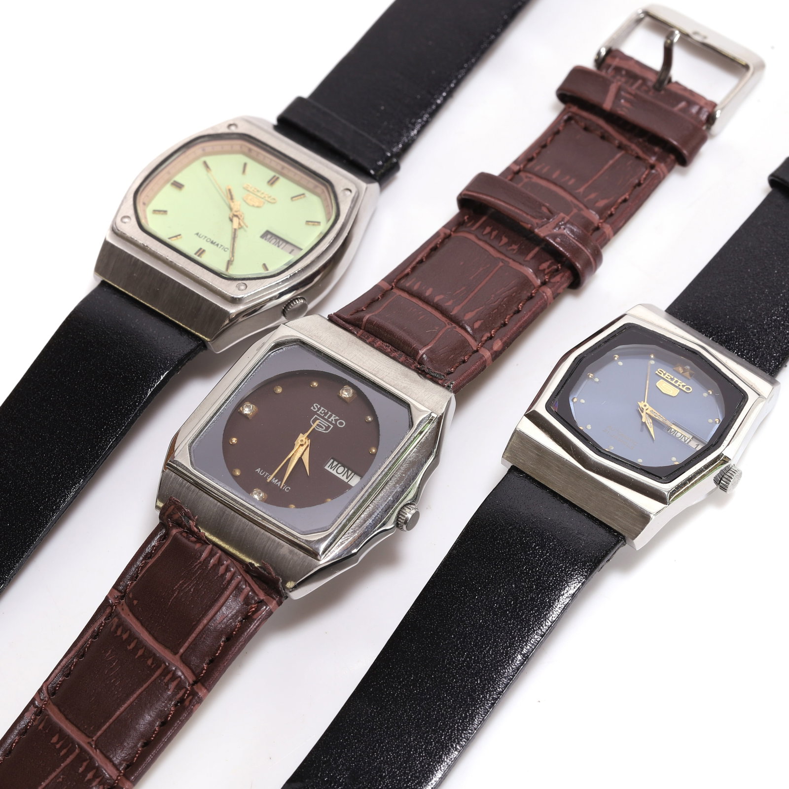 Seiko, a group of three vintage stainless steel automatic strap watches, (1 of 1)