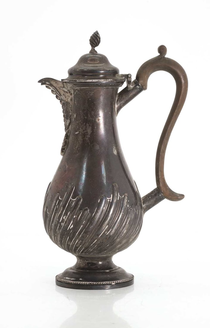 A silver coffee pot ,: A silver coffee pot , maker rubbed, London, 1899 with twisiting finial, beaded decoration throughout and to the under of the spout 25cm high, 14.4ozt