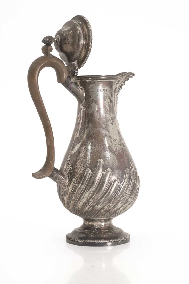 A silver coffee pot , - 2
