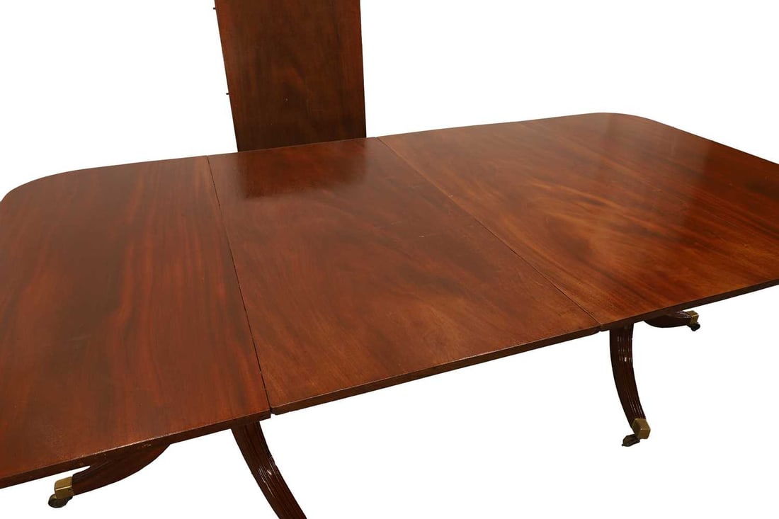 A twin-pedestal mahogany dining table, 19th century, - 2
