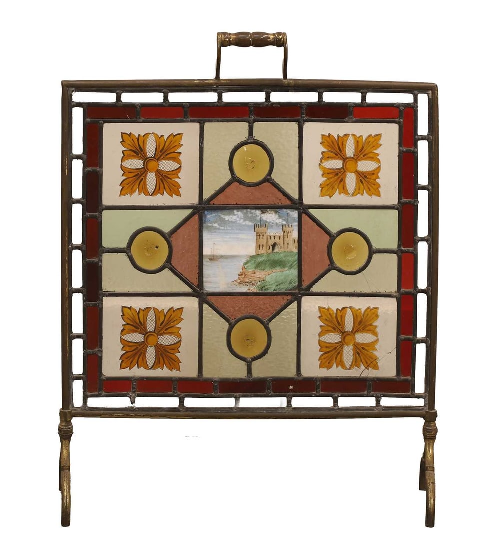 A stained-glass fire guard, late 19th century,: A stained-glass fire guard, late 19th century, the central panel depicting a castle, with alternating bordering panels 57.5cm wide, 63.5cm high