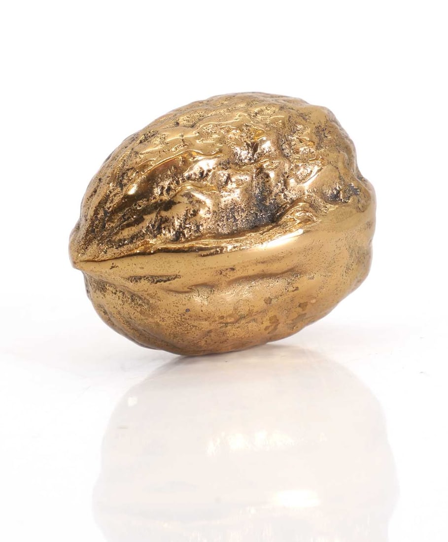 A brass model of a walnut, late 19th century, - 2
